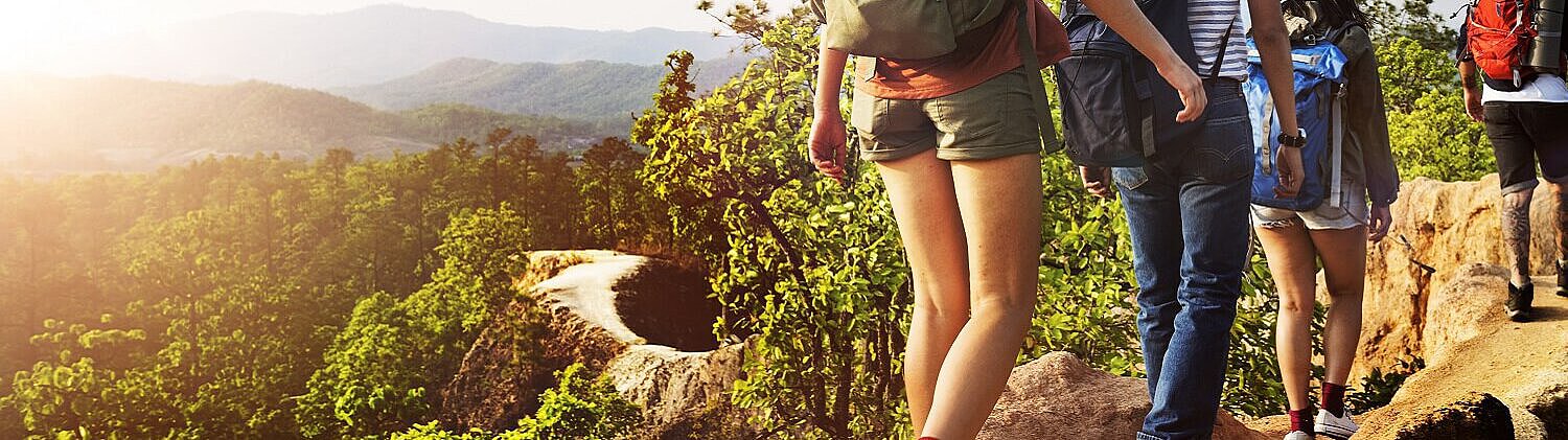 [Translate to Englisch:] Leute wandern in den Bergen